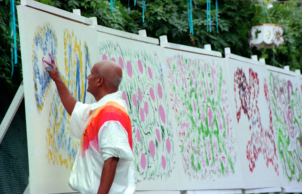 Sri Chinmoy creating large paintings